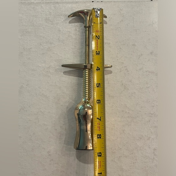 Shiny gold twisting corkscrew wine opener. Very cool! - Picture 4 of 5